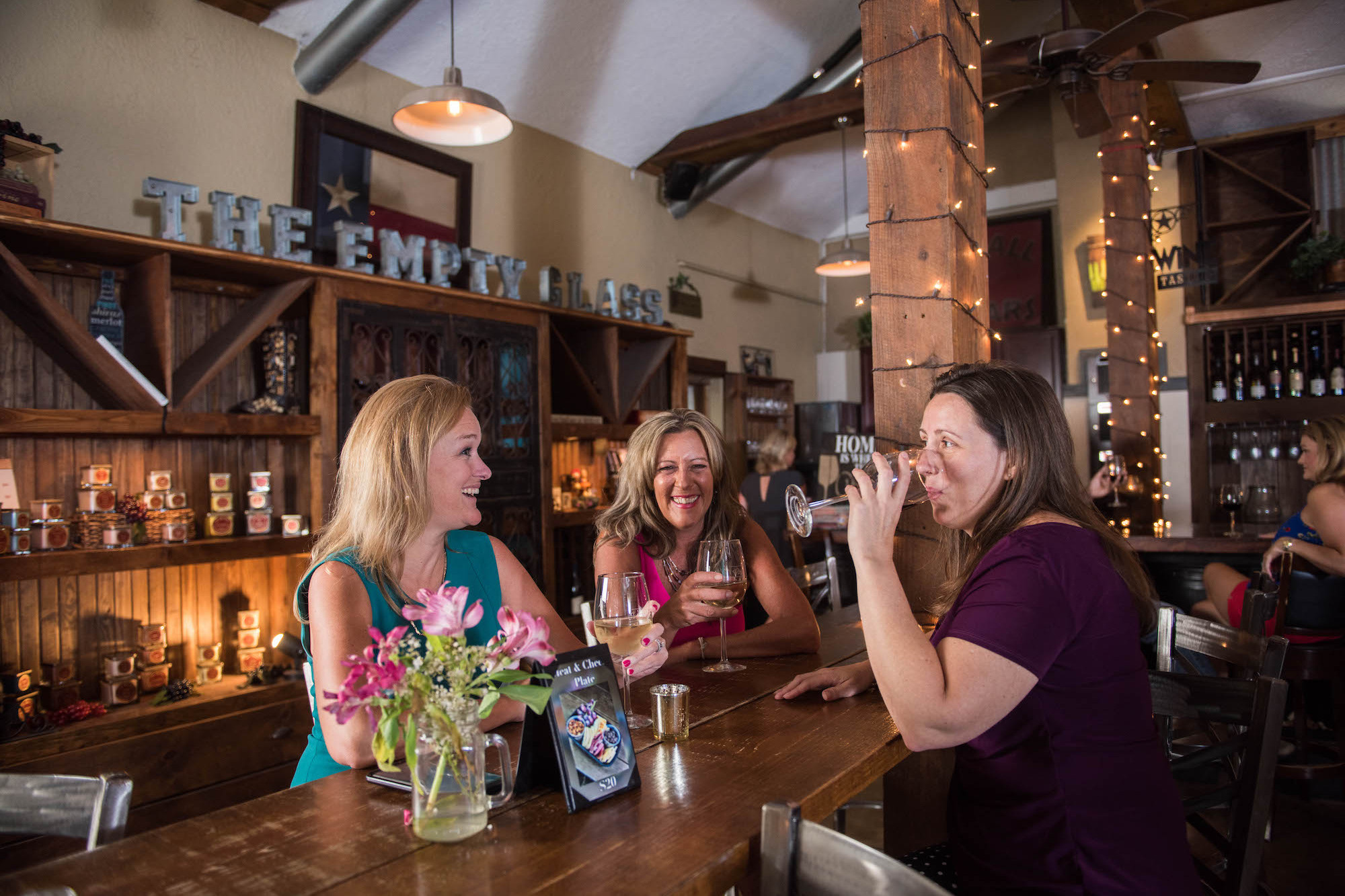 Women drinking wine at The Empty Glass